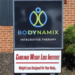 Exterior signage for Body Dynamix Integrative Therapy and Carolinas Weight Loss Institute displayed outside the clinic.